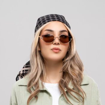 عینک دودی زنانه گوچی کد EYN50 | عینک بیضی طلایی با لنز UV400